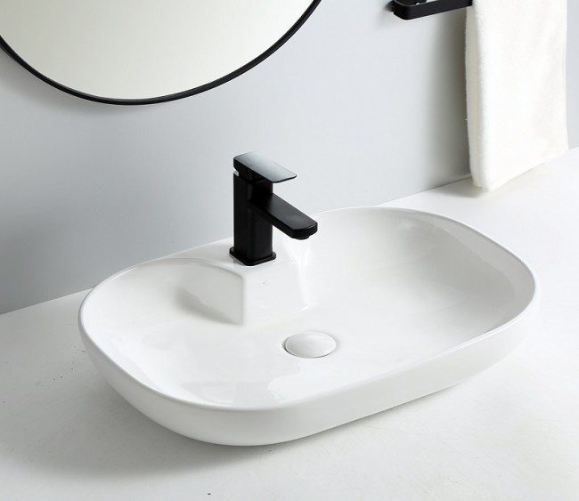 Умывальник CeramaLux 9446 Умывальник CeramaLux 9446